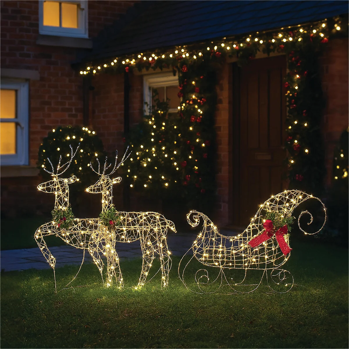 LED Outdoor/Indoor Light Up Sledge and Deer Warm White (Pack of 3) XH10089 - Image 1